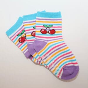 Colorful striped children's socks with cherries