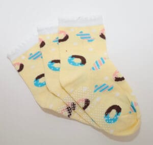 Yellow ankle socks with donut pattern