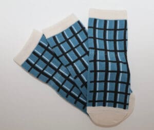 Three blue plaid ankle socks with white trim
