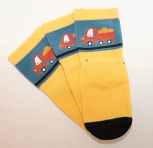 Children's yellow socks with dump truck design