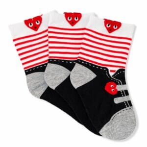 Three red and white striped socks with hearts